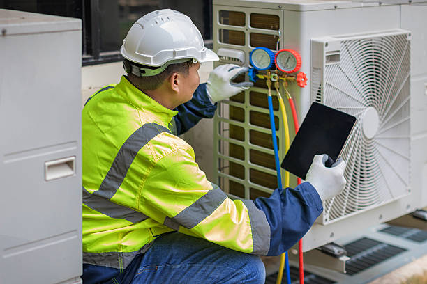 Professional Air Conditioning Repair technician working in Harrisburg, OR